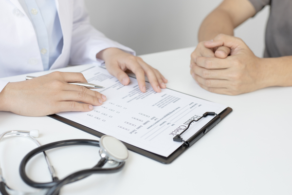 Medical professional reviewing patient health information